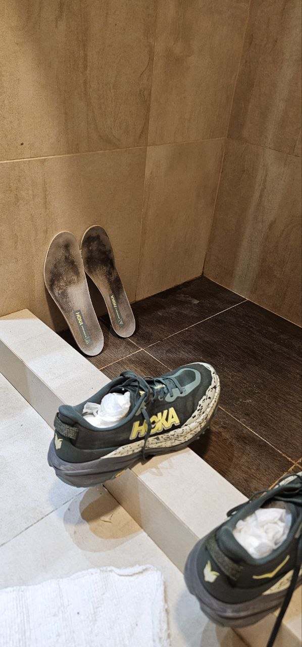 Hoka Speedgoat — insoles out, paper inside, race done